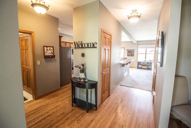 120 Wind Sail Ct, Random Lake, WI 53075 - corridor featuring light wood finished floors and baseboards