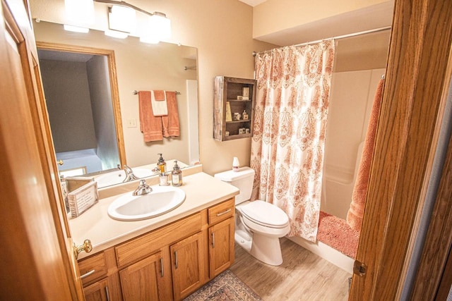 120 Wind Sail Ct, Random Lake, WI 53075 - full bath with vanity, wood finished floors, and shower / bath combo with shower curtain