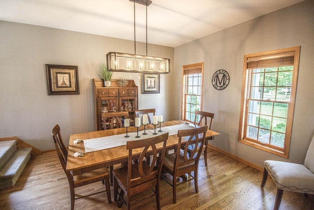 120 Wind Sail Ct, Random Lake, WI 53075 - dining space with wood finished floors and baseboards