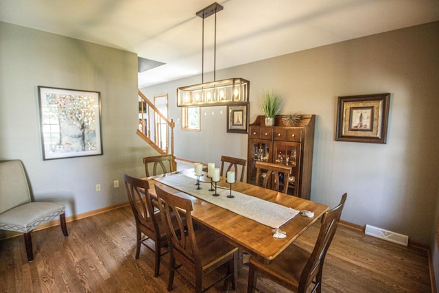 120 Wind Sail Ct, Random Lake, WI 53075 - dining room featuring wood finished floors and stairs