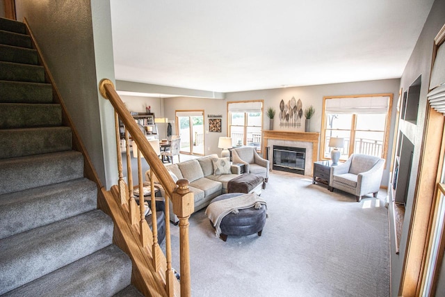 120 Wind Sail Ct, Random Lake, WI 53075 - carpeted living area with a fireplace and stairs