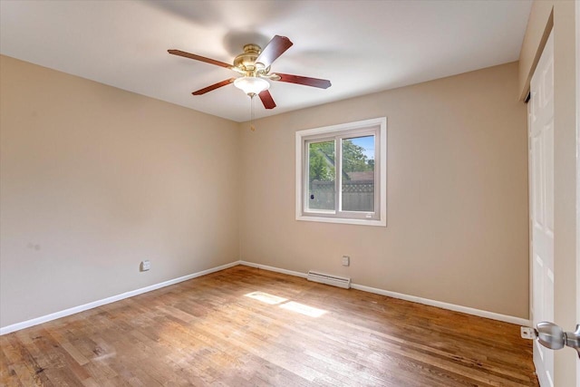 3918 W Hampton Ave, Milwaukee, WI 53209 - spare room featuring ceiling fan and wood finished floors