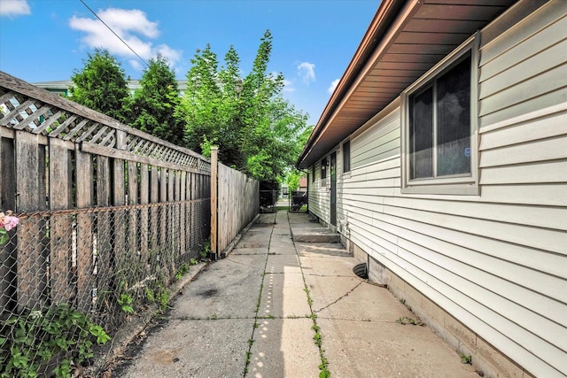 3918 W Hampton Ave, Milwaukee, WI 53209 - view of property exterior with a fenced backyard and a patio area