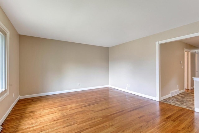 3918 W Hampton Ave, Milwaukee, WI 53209 - empty room with light wood-style floors and baseboards