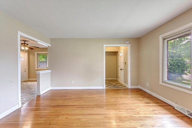 3918 W Hampton Ave, Milwaukee, WI 53209 - unfurnished room featuring light wood-style floors and ceiling fan