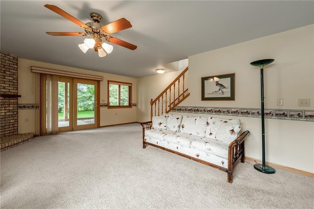3413 Mcelroy Ct, Eau Claire, WI 54701 - unfurnished living room featuring carpet floors, stairway, and a ceiling fan