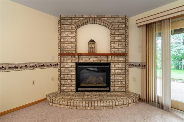 3413 Mcelroy Ct, Eau Claire, WI 54701 - detailed view of carpet flooring and a brick fireplace