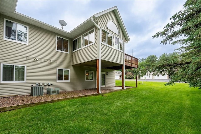 3413 Mcelroy Ct, Eau Claire, WI 54701 - back of house with a lawn and a deck