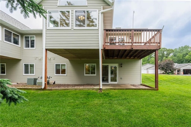 3413 Mcelroy Ct, Eau Claire, WI 54701 - back of house with a yard, a wooden deck, and a patio