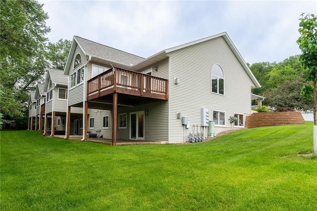 3413 Mcelroy Ct, Eau Claire, WI 54701 - rear view of property with a yard and a deck