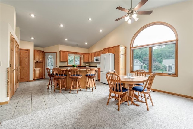 3413 Mcelroy Ct, Eau Claire, WI 54701 - dining area featuring ceiling fan, recessed lighting, light colored carpet, and high vaulted ceiling