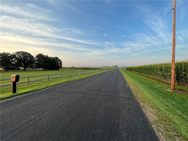 N6894 690th St, Menomonie, WI 54751 - view of asphalt street featuring a rural view