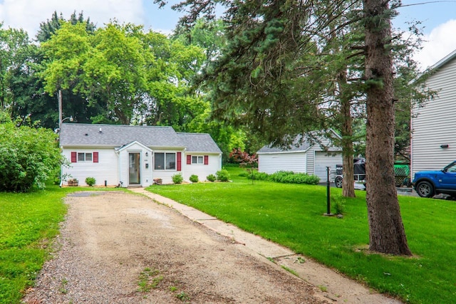 720 De Clark St, Beaver Dam, WI 53916 - view of front of house featuring a front yard and dirt driveway