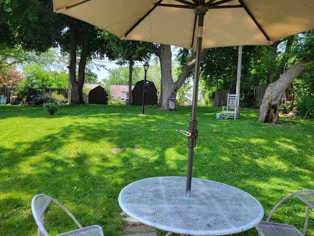 720 De Clark St, Beaver Dam, WI 53916 - view of yard featuring a shed
