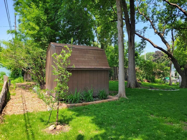 720 De Clark St, Beaver Dam, WI 53916 - view of green lawn featuring a storage shed