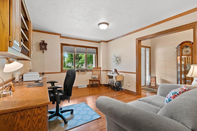 2510 Hillside Heights Dr, Green Bay, WI 54311 - home office featuring wood finished floors, ornamental molding, and a textured ceiling