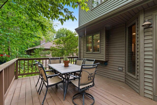 2510 Hillside Heights Dr, Green Bay, WI 54311 - wooden deck featuring outdoor dining area