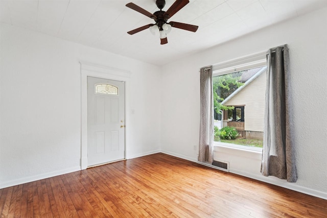 136 Oak St, Brillion, WI 54110 - empty room featuring ceiling fan and light wood-style flooring