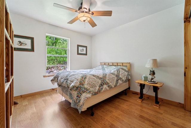 5093 County Highway G, Cavour, WI 54511 - bedroom with light wood finished floors and a ceiling fan