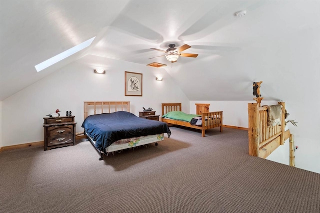 5093 County Highway G, Cavour, WI 54511 - bedroom featuring carpet floors, vaulted ceiling, a skylight, and a ceiling fan