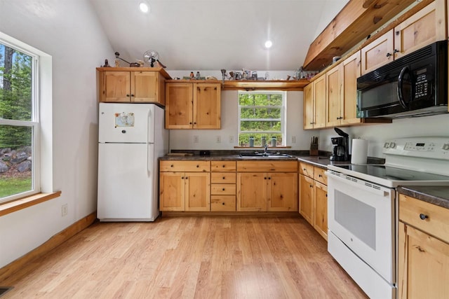 5093 County Highway G, Cavour, WI 54511 - kitchen with white appliances, dark countertops, lofted ceiling, light wood-style floors, and recessed lighting