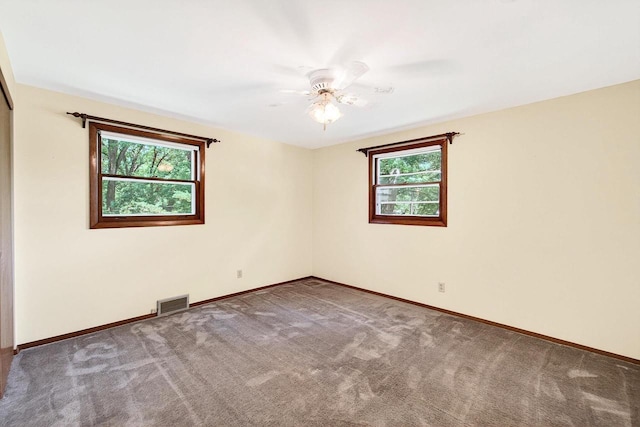 2813 Regent St, Madison, WI 53705 - carpeted empty room with baseboards and ceiling fan