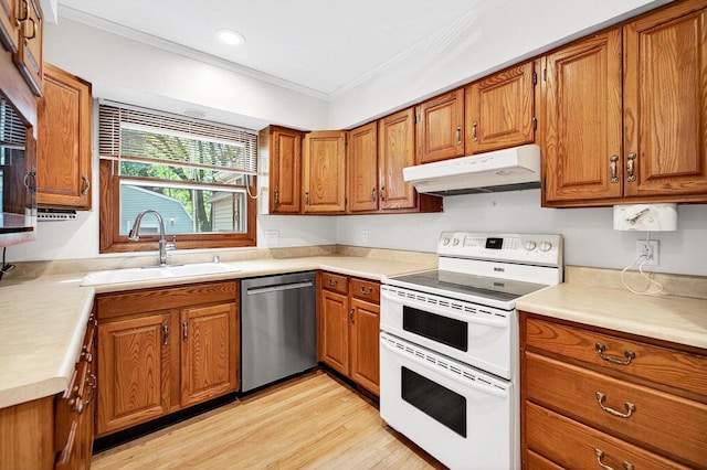 2813 Regent St, Madison, WI 53705 - kitchen with dishwasher, range with two ovens, under cabinet range hood, brown cabinets, and ornamental molding