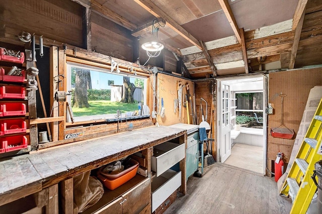 2813 Regent St, Madison, WI 53705 - miscellaneous room featuring wood finished floors and a workshop area