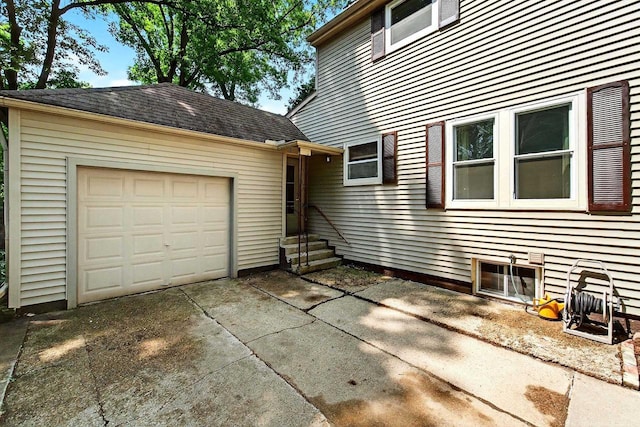 2813 Regent St, Madison, WI 53705 - view of property exterior with a garage and driveway