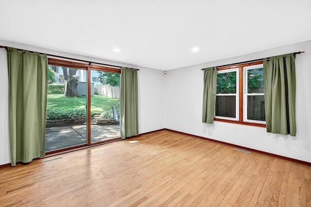 2813 Regent St, Madison, WI 53705 - empty room featuring wood finished floors and recessed lighting