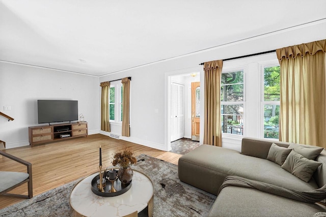 2813 Regent St, Madison, WI 53705 - living area featuring wood finished floors and plenty of natural light