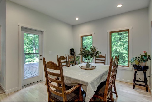 1403 Elm Ave, Menomonie, WI 54751 - dining area featuring light wood finished floors and recessed lighting