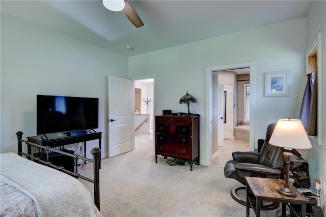 1403 Elm Ave, Menomonie, WI 54751 - bedroom featuring light carpet, ensuite bath, and ceiling fan