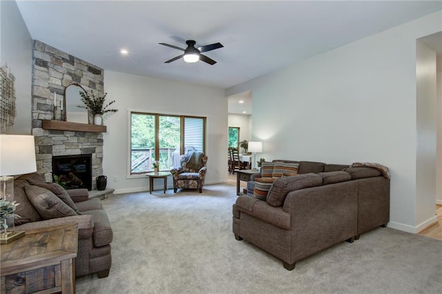 1403 Elm Ave, Menomonie, WI 54751 - living area with ceiling fan, light colored carpet, a fireplace, and recessed lighting