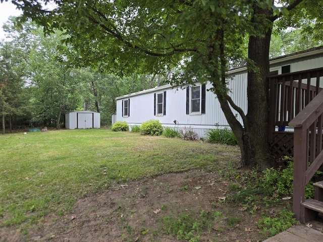 2143 County Road Z, Friendship, WI 53934 - view of green lawn with a storage shed and a deck