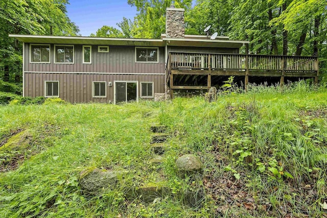 N12757 Rivers Meet Dr, Athelstane, WI 54104 - back of property with a chimney and a deck