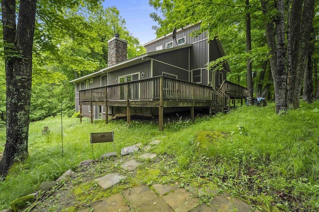 N12757 Rivers Meet Dr, Athelstane, WI 54104 - rear view of property with a wooden deck and a chimney