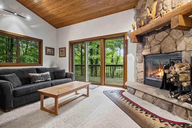 N12757 Rivers Meet Dr, Athelstane, WI 54104 - carpeted living room featuring wood ceiling, vaulted ceiling, and a stone fireplace