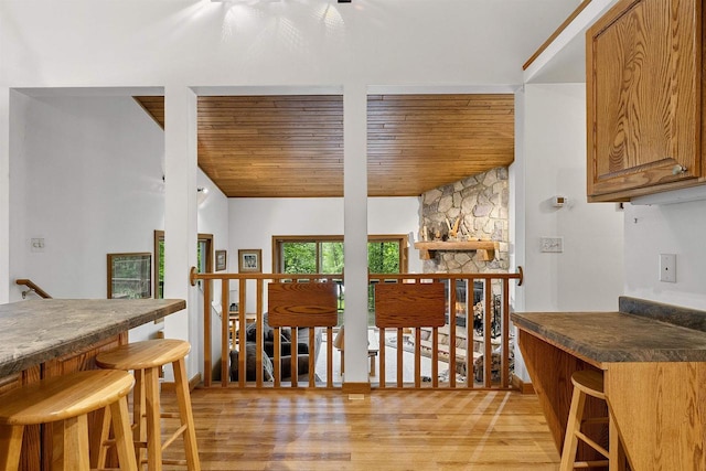 N12757 Rivers Meet Dr, Athelstane, WI 54104 - dining area with light wood-style floors, wooden ceiling, and lofted ceiling