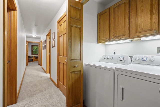 N12757 Rivers Meet Dr, Athelstane, WI 54104 - washroom featuring cabinet space, light colored carpet, and washing machine and dryer