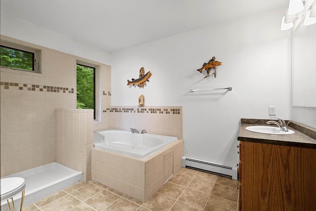 N12757 Rivers Meet Dr, Athelstane, WI 54104 - bathroom with a baseboard radiator, vanity, a bath, and tile patterned flooring