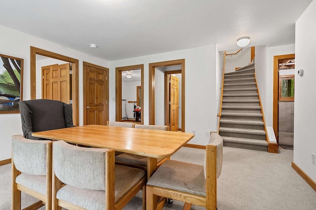 N12757 Rivers Meet Dr, Athelstane, WI 54104 - carpeted dining room with baseboards and stairs