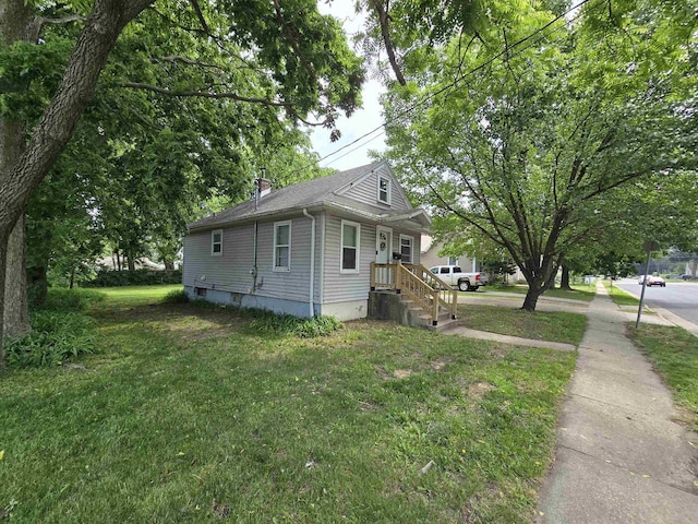 1131 6th St, Beloit, WI 53511 - view of property exterior featuring a yard