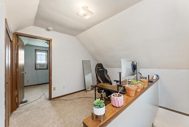 1432 Loomis St, La Crosse, WI 54603 - office space featuring a textured ceiling, vaulted ceiling, light carpet, and cooling unit