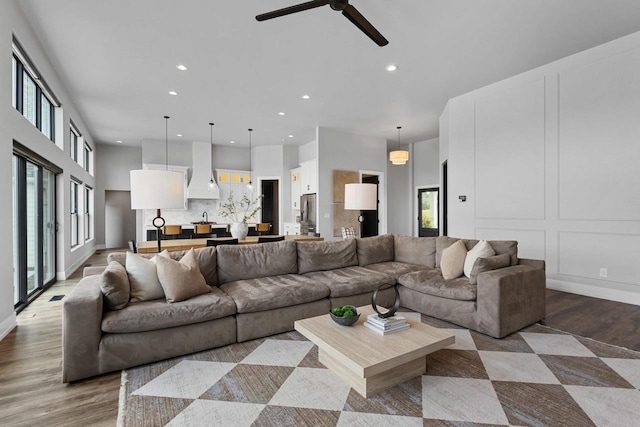 7205 N Trinity Ct, Appleton, WI 54913 - living room featuring recessed lighting, light wood-style floors, and ceiling fan