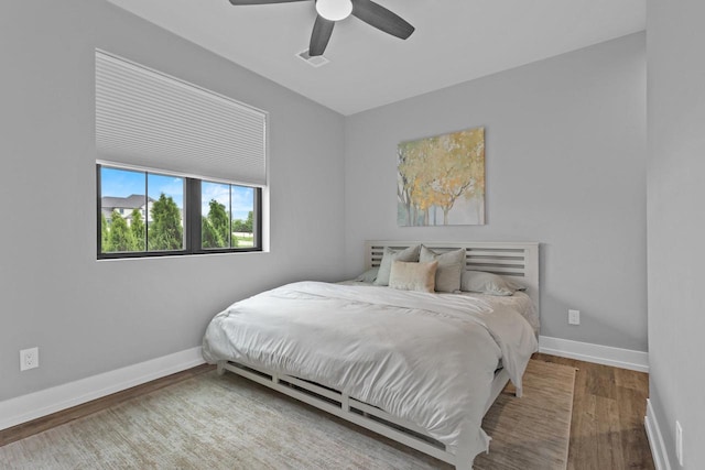 7205 N Trinity Ct, Appleton, WI 54913 - bedroom with wood finished floors and a ceiling fan