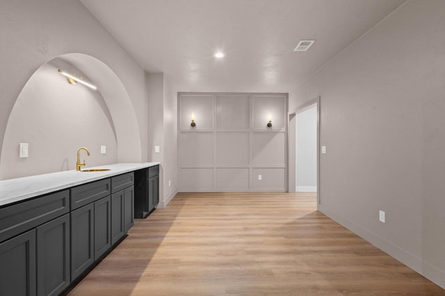 7205 N Trinity Ct, Appleton, WI 54913 - bar featuring light wood-style floors, recessed lighting, and built in features