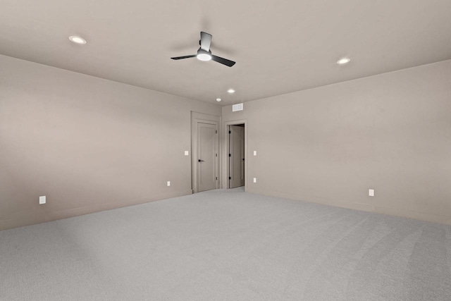 7205 N Trinity Ct, Appleton, WI 54913 - empty room with ceiling fan, recessed lighting, and light carpet