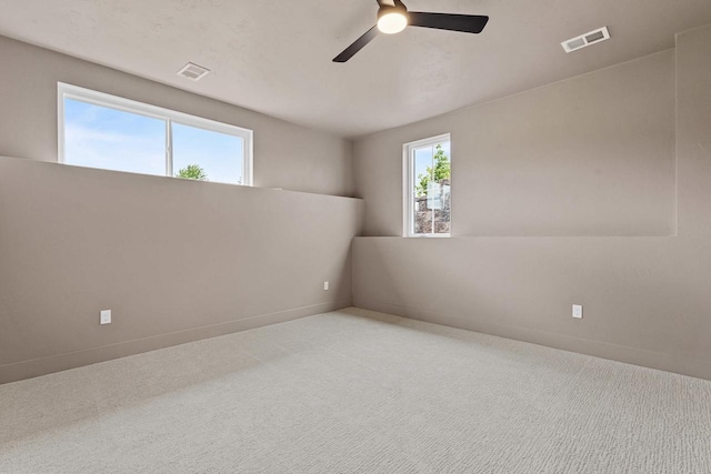 7205 N Trinity Ct, Appleton, WI 54913 - carpeted spare room with ceiling fan and baseboards