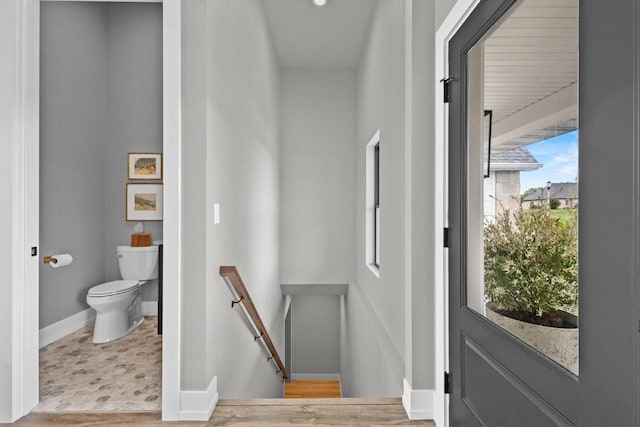 7205 N Trinity Ct, Appleton, WI 54913 - entryway featuring baseboards and wood finished floors